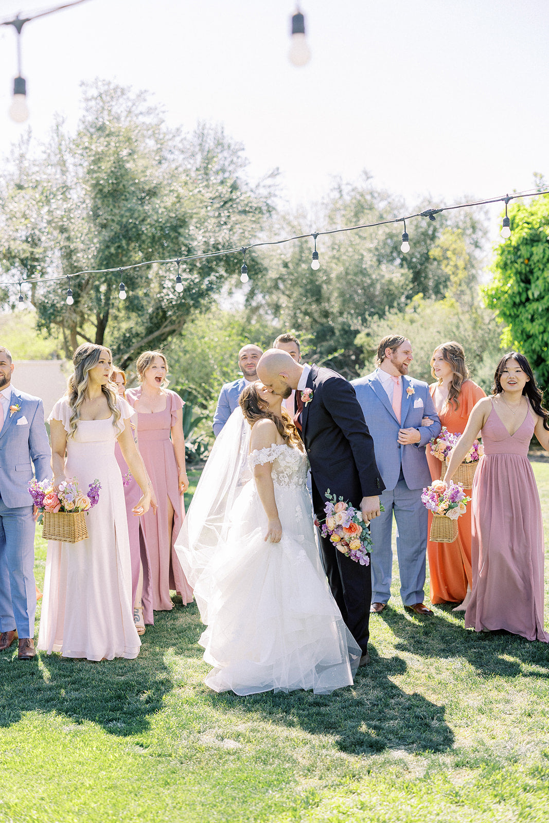 bride and groom with wedding party